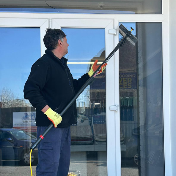 Kenny cleaning windows in Stockton